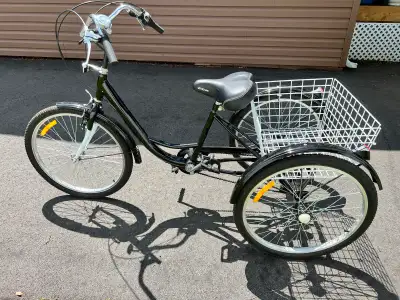 24 in wheels 7 Shimano gears. Looks & rides like new.Wife bought it & has decided she cant ride it....