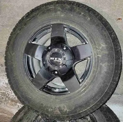 Toyo open country winter tires 265/70/17's on Rtx rims. Came off 2010 chev. Rims/tires purchased tog...