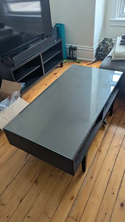 Dark coffee table with glass top, View more