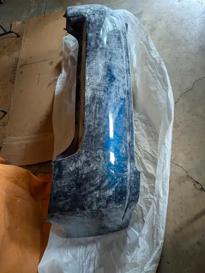 Nissan Sentra 2.0 L Rear Bumper part # NI1100249 Painted paint code B23 Blue Dusk Metallic. Brand ne...