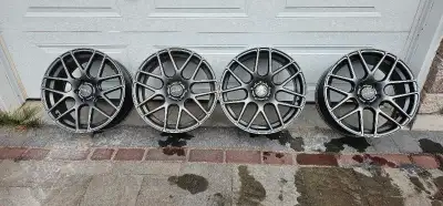 A set of four used aftermarket aluminum alloy rims that were mounted on summer tires for a 2014 Toyo...