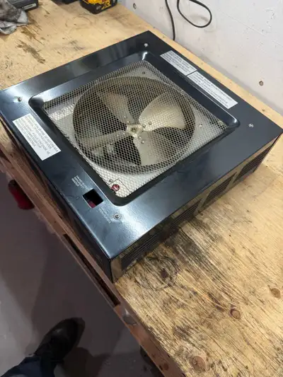I'm offering a used 5000W, 240V ceiling-mounted garage heater. This heater is designed to be hardwir...