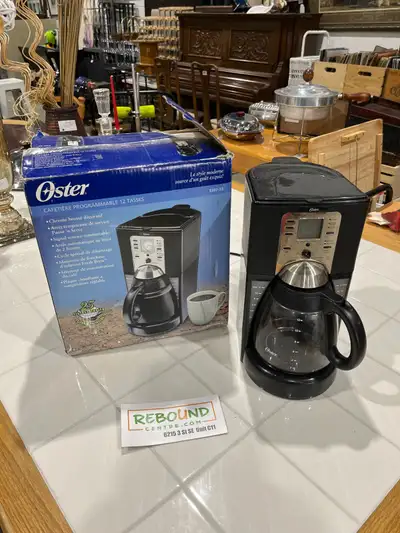 Brew the perfect cup every morning with this Oster 12-cup programmable coffee maker, model number 33...