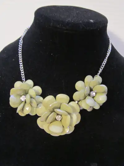 This necklace is in good used condition with no damage. It measures 14 inches long but can expand to...