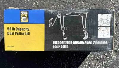 New in box. Dual pulley bicycle lift. Cost $25 new. Asking $15