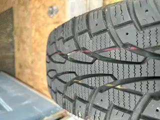 Uniroyal Tiger Paw Ice & Snow Four winter tires 185/70R14 Tread depth 7 - 8mm $225