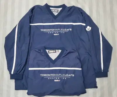 B 8C Here we have a pre owned matching pair of Toronto maple leafs ccm center ice insulated pullover...