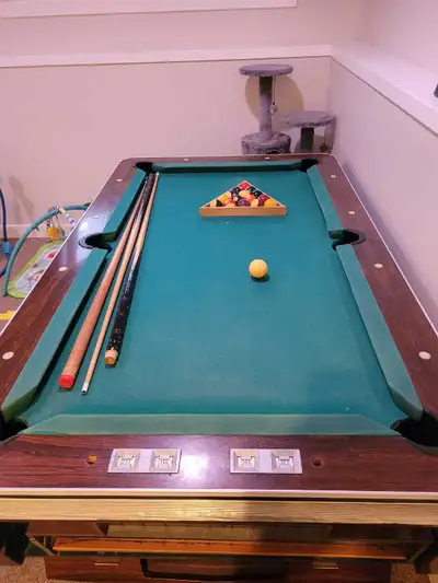 Authentic, solid-construction bar-style pool table, originally coin-operated in Germany. Slate playi...