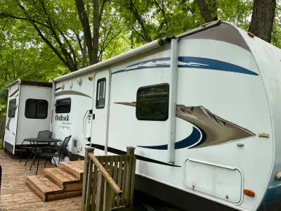 2010 Outback Trailer in new condition. Site paid for the season at Fanshawe camp ground in London. C...