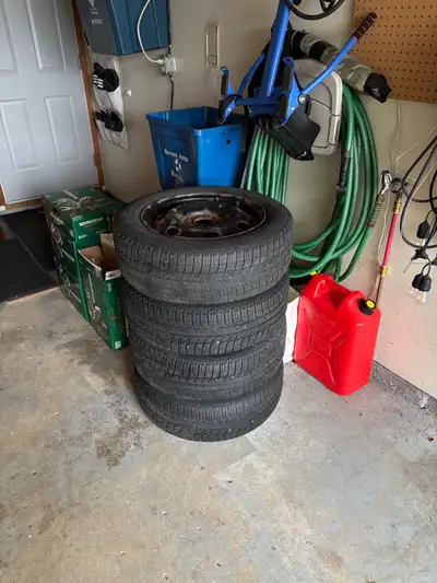 Get these just in time for winter , Used winter tires and 16 inch steel rims, tire size are 205/60R1...
