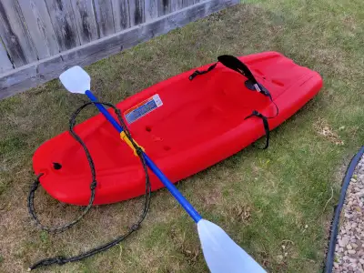 Good for 100 lbs. Solo Kayak and paddle in great shape 125 OBO