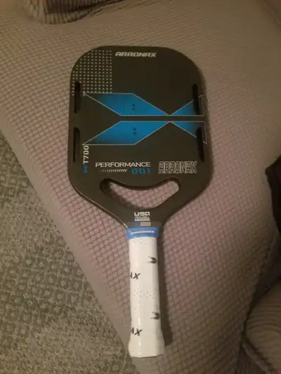 Arronax T700 graphite used pickleball paddle for sale . New never used.