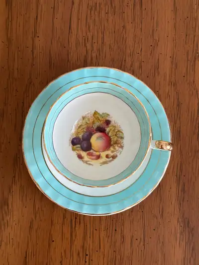 Beautiful Aynsley fine bone china teacup and saucer, hand-painted orchard fruit design. Signed by ar...