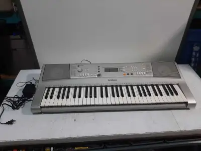 Yamaha PSR-E303 with power supply, View more
