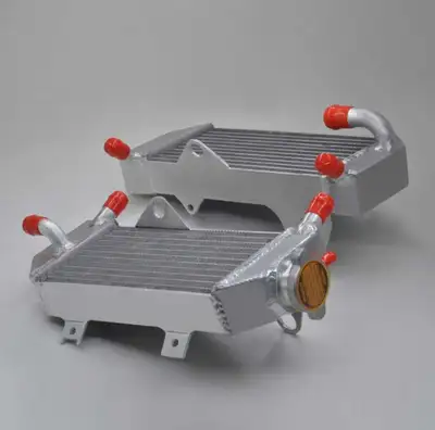 Enhance your Honda CRF250R (2010-2013 models) with this high-performance aluminum alloy radiator. De...