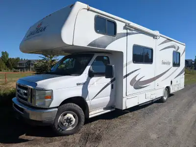 Large slide out on this roomy motorhome. Can sleep up to 6 people. Easy to drive.