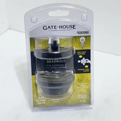 This is a new Gatehouse deadbolt lock with an aged bronze finish, ensuring your home's security with...