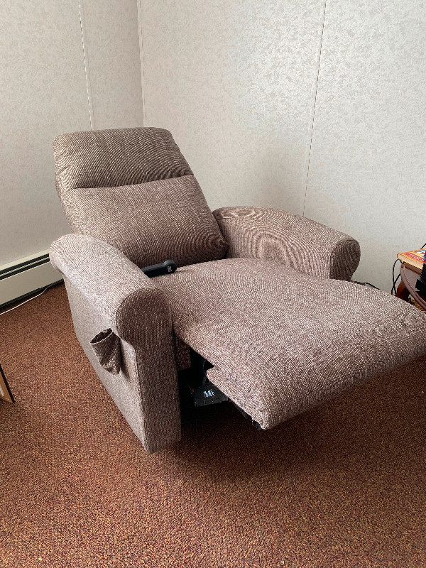 Electric standup and reclining chair. in Chairs & Recliners in Strathcona County