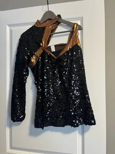 Black sequin lined, one sleeved top with bronze colored straps Size Adult XL A Wish Come True Brand...