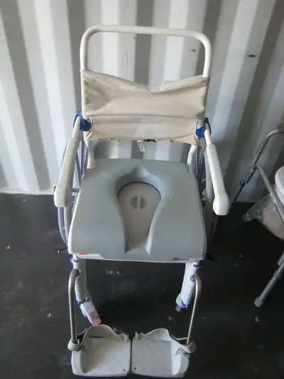 Shower commode with removeable rear wheels., View more