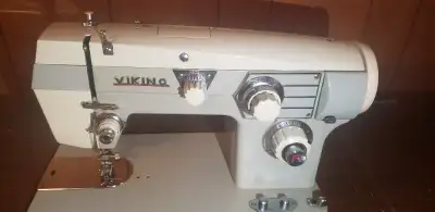Viking sewing machine within table, 4 drawers hardly used, View more