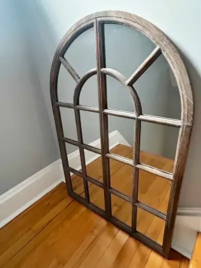 Arch-Top Wall Mirror in distressed wood grain finish. Excellent condition. 37.5"(h) x 25.5"(w).