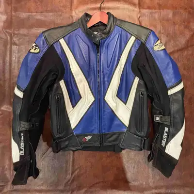 Women’s Joe Rocket leather motorcycle jacket with protective padding. Excellent used condition. If t...