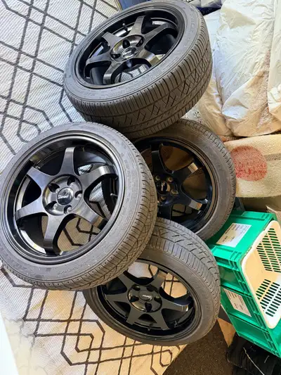 Selling my rims and tires FALKEN all season 215/45R17 Bolt pattern 5x100. I just used it for one sea...