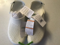 Brand new Crocs in size 10