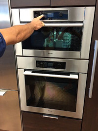 Miele 30" Double wall oven, top is Microwave Convection oven. Be