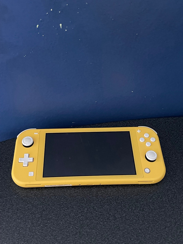 Yellow Nintendo Switch Lite + Game and acessories | General Electronics |  Ottawa | Kijiji