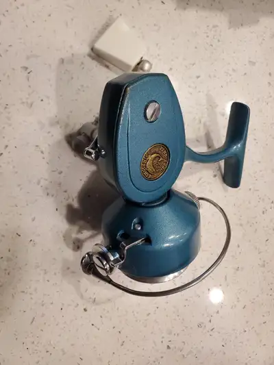 Vintage fishing reel, View more