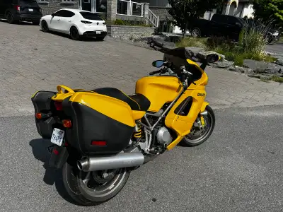 This vibrant yellow Ducati ST4 is in great condition with only 9,764 kilometers on the odometer. It...