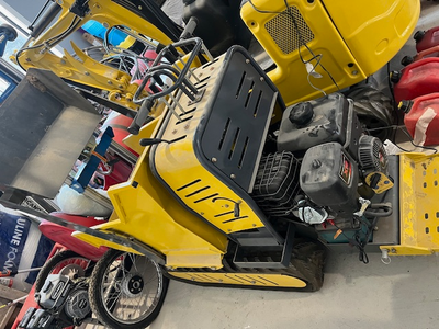1 ton Excavator with Kubota engine c/w 5 shovel kit and auger power wheelbarrow with Briggs engine