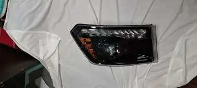 2019-2024 Dodge Ram Pick UP 1500,2500 and 3500 series Head Lamp LH Halogen Projector Type Black Beze...