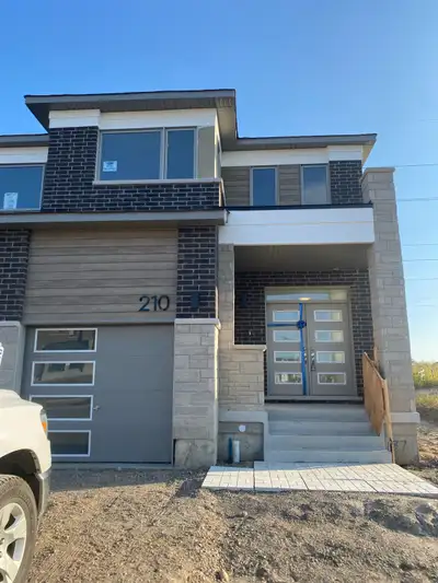 3 Bedroom, 3 Bathroom, 2 Storey End Unit Townhome. Open-Concept Main Living Space Includes A Great R...