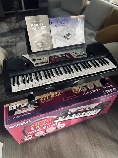 Great Sounding Yamaha piano keyboard with box and stand, View more