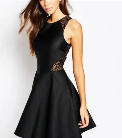 TED BAKER LONDON “Venma” Cocktail Dress Features • Round neck, sleeveless, fit-and-flare silhouette...