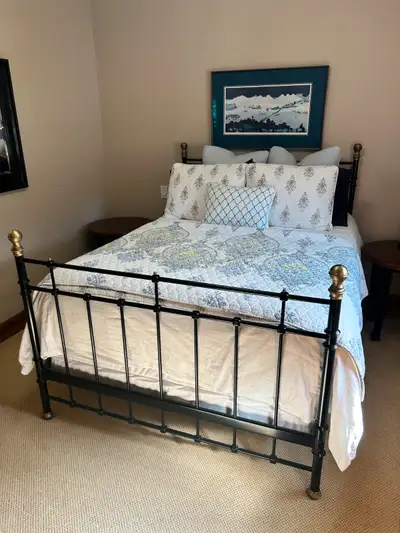 Used black iron double-sized bed frame, mattress, box spring., View more