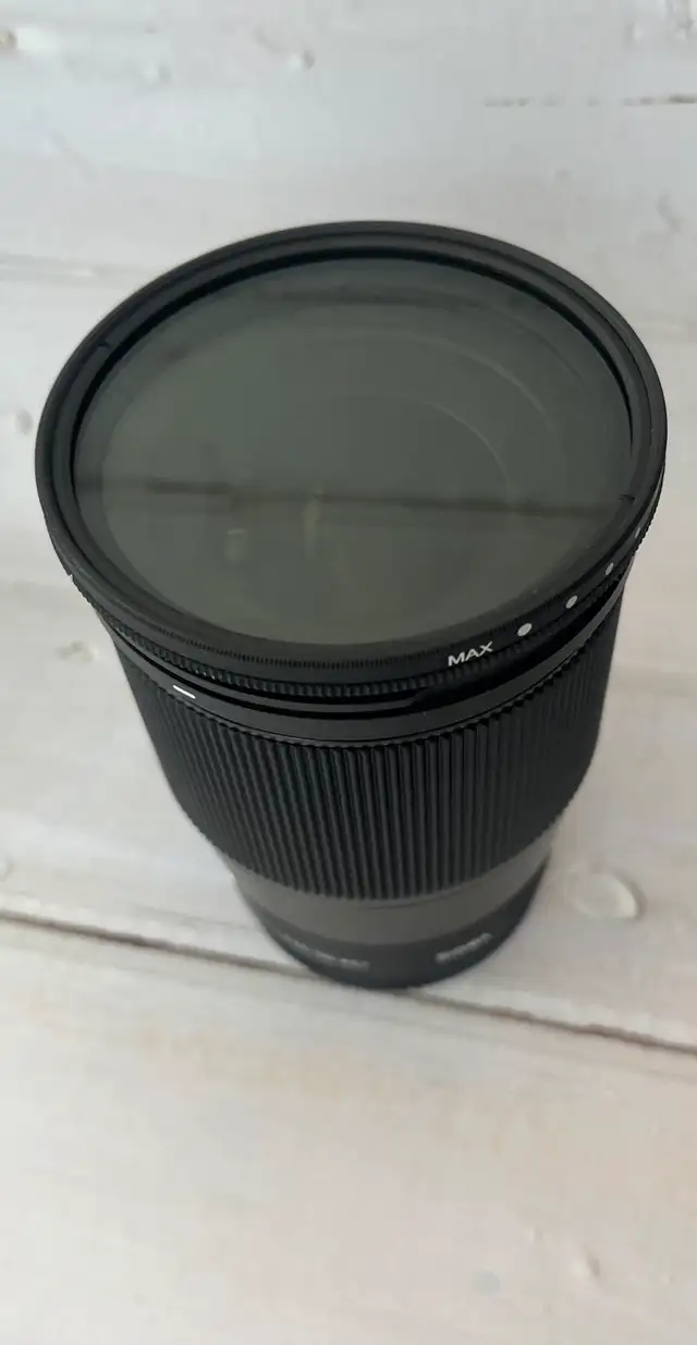 Sigma 16mm f/1.4 Canon EF-M + ND Filter – Mint63735878204289122