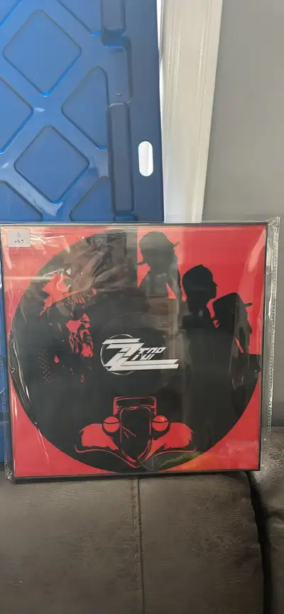 Selling brand new in black frame 12x12 Classic rock vinyl record cut outs selling for $35.00 each pl...