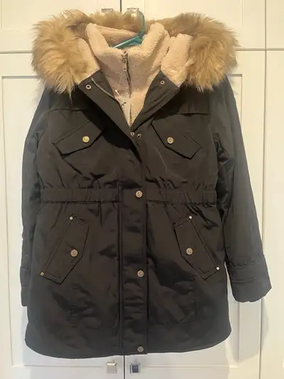Brand new w tags size large, girls UGG parka in black, fur hood trim is removable, has Sherpa lining...
