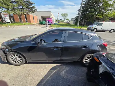 Selling my 2016 Mazda3 Sport hatchback with 283,000 km. Vehicle was involved in a front-end collisio...
