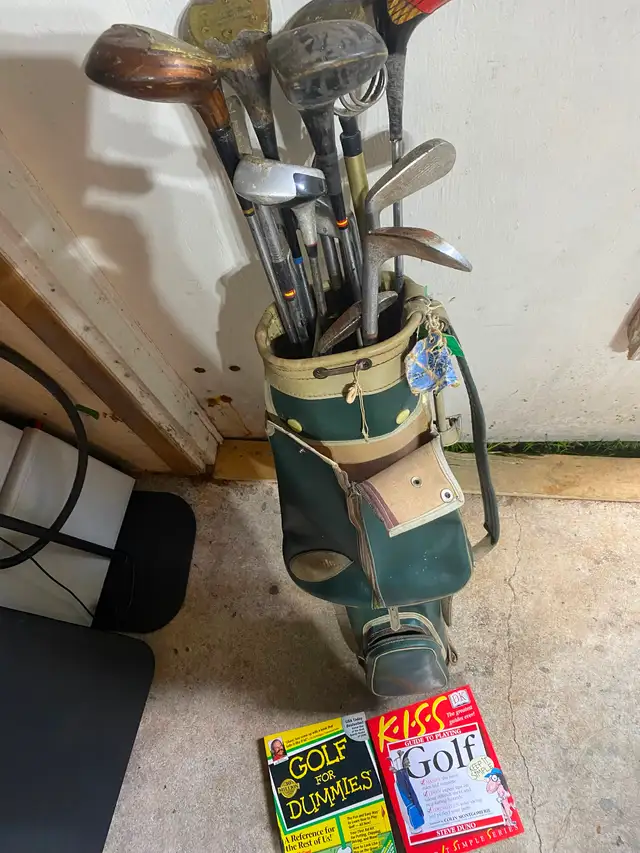 12 Older Golf Clubs and Bag and 2 Golf Books