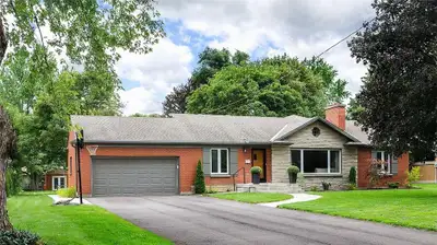 Stay in the Cottage in the City — A beautiful executive bungalow tucked away on a quiet, family-frie...