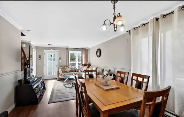 4.5-BEDROOM TOWNHOUSE-STYLE APARTMENT ACROSS 2 FLOORS – BLAINVILLE