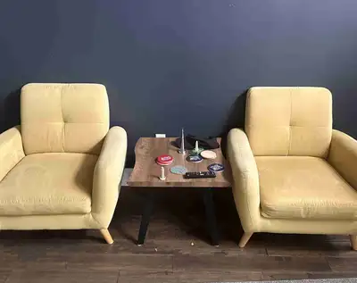 Yellow pair of two single sofa bought from Structube and in good condition.