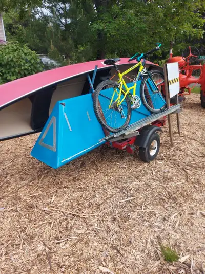 Very versatile, light and easy to move around. Perfect for camping trips. Carries bikes, paddle boar...