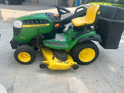 John Deere mower with attachments, View more