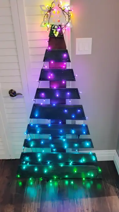 Custom Built Pallet Christmas Trees. One with LEDs, one without. Asking $200 for one with LEDs, and...